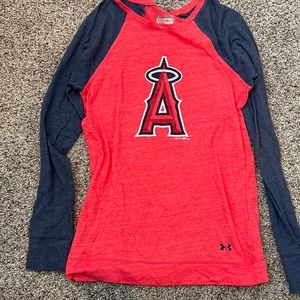 Hardly‎ worn under armor, angels size medium. No holes/stains. Non smoking home